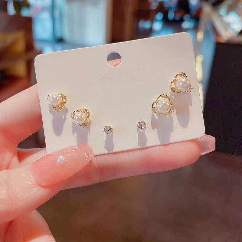 925 silver plated set asymmetrical Korean simple swan snowflake temperament female earrings student cat cat stone earrings wholesale 7