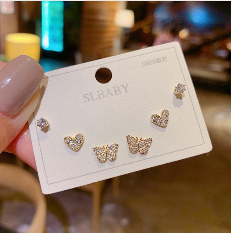 925 silver plated set asymmetrical Korean simple swan snowflake temperament female earrings student cat cat stone earrings wholesale 9