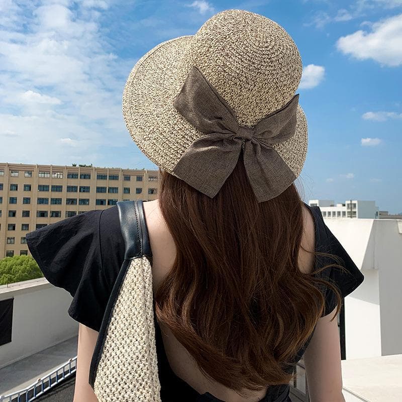 The new Korean version of the lady's sunny beach hat female split big bow is fashionable, sunscreen big straw hat
