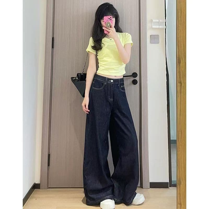 Retro dark blue jeans, trousers, high waist, loose straight fit, slim silhouette 2