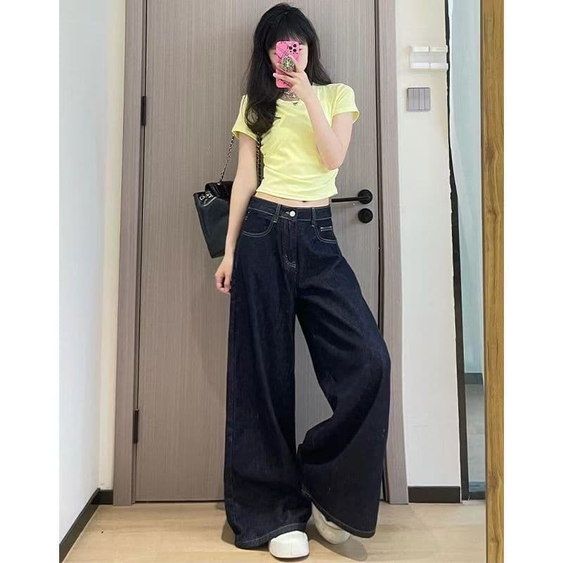 Retro dark blue jeans, trousers, high waist, loose straight fit, slim silhouette 4